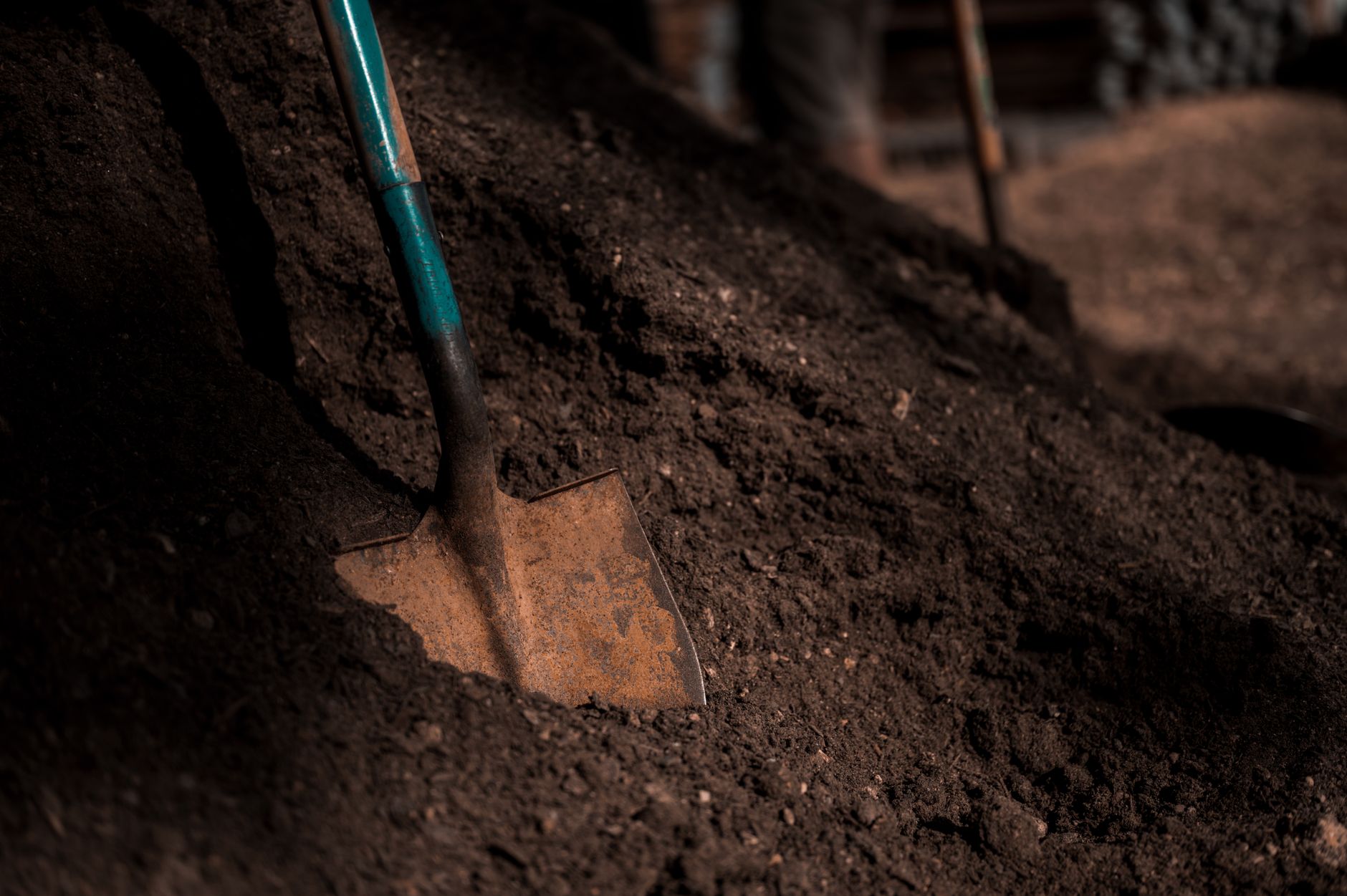 Close-up of compost and topsoil mix used for raised bed gardening UK soil preparation